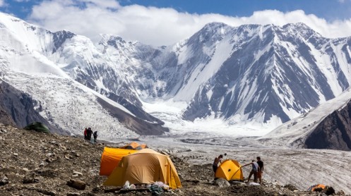 trekkers-assembling-their-tents-at-the-foot-of-kanchenjunga-base-camp